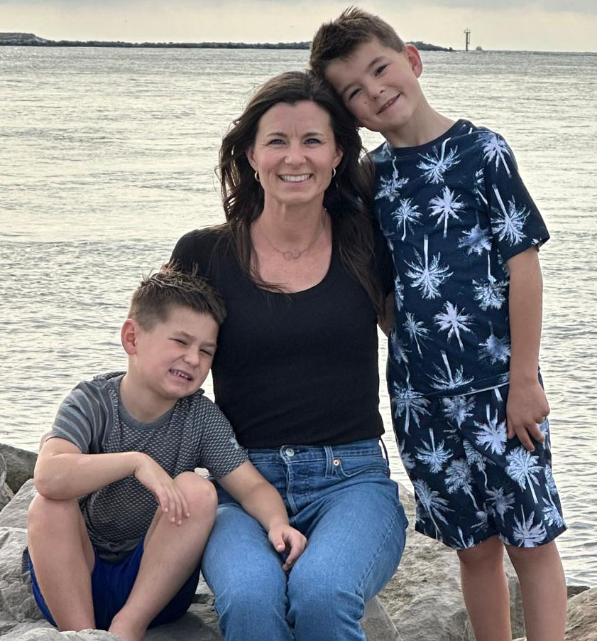 Katie Wilson, RN, founder of Lets Go Gluten Free, with her two sons by the water